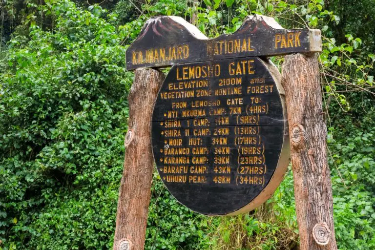 Kilimanjaro National Park Lemosho Gate sign with hiking distances